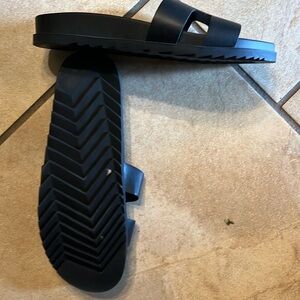 Ladies black polyurethane Madden Girl slides with 1” heel